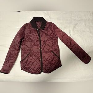 Quilted maroon Barbour jacket with brown corduroy collar and sleeve trim. Size 4
